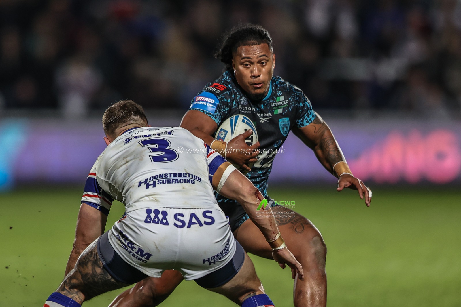 Tesi Niu of Leigh Leopards in action during the game during the Betfred Challenge Cup Quarter Final match Wakefield Trinity vs Leigh Leopards at DIY Kitchens Stadium, Wakefield, United Kingdom, 4th April 2025

(Photo by Alfie Cosgrove/News Images)