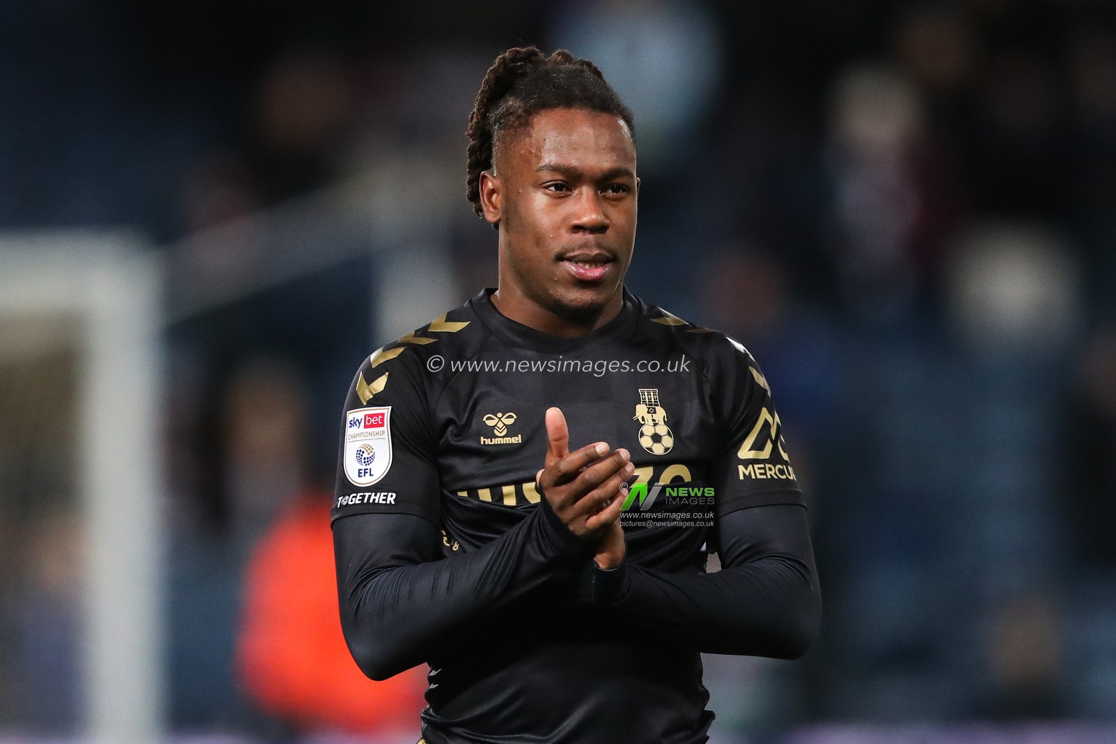Brandon Thomas-Asante of Coventry City applauds the travelling fans after the Sky Bet Championship match West Bromwich Albion vs Coventry City at The Hawthorns, West Bromwich, United Kingdom, 11th December 2024

(Photo by Gareth Evans/News Images)