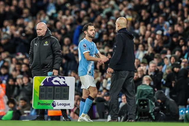 Bernardo Silva of Manchester City shakes hands with Josep Guardiola manager of Manchester City as he is substituted off during the Premier League match Manchester City vs Crystal Palace at Etihad Stadium, Manchester, United Kingdom on 13 May 2026

(Photo by Mark Cosgrove/News Images)