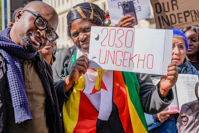UK-based Zimbabweans gather outside the Zimbabwe Embassy in London on 18 April 2026 to protest the Constitution of Zimbabwe Amendment (No. 3) Bill, which critics say would extend President Mnangagwa’s rule until 2030 and strip citizens of the direct vote for president.

(Photo by Maynard Manyowa/News Images)