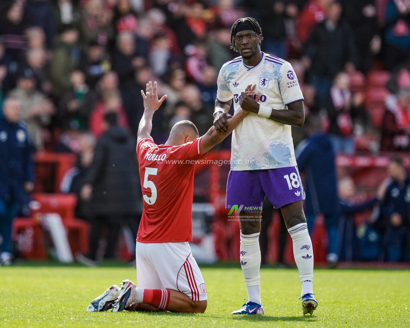 Tammy Abraham of Aston Villa prays for Murillo of Nottingham Forest at full time during the Premier League match Nottingham Forest vs Aston Villa at City Ground, Nottingham, United Kingdom on 12 April 2026

(Photo by Maynard Manyowa/News Images)