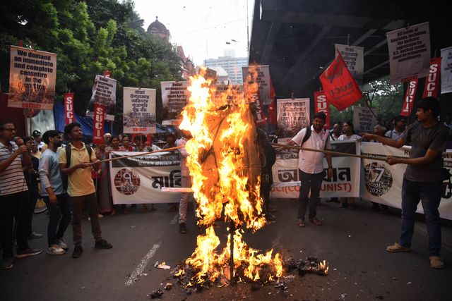 Activists from the Socialist Unity Centre of India (SUCI) burned an effigy of U.S. President Donald Trump and Israeli Prime Minister Benjamin Netanyahu during an anti-Israel protest to express solidarity with Palestinians, in Kolkata on October 7, 2025.Photo by Debajyoti Chakraborty.(Photo: Debajyoti Chakraborty/News Images)