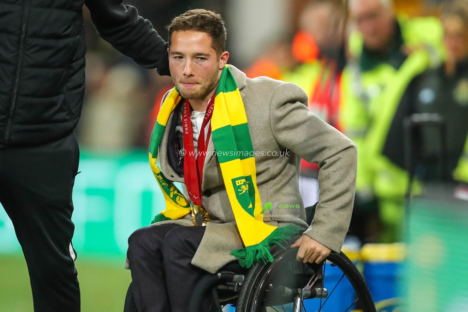 Alfie Hewett (Paralympics GB) shows his medal to the crowd during the Sky Bet Championship match Norwich City vs Leeds United at Carrow Road, Norwich, United Kingdom, 1st October 2024

(Photo by Izzy Poles/News Images)