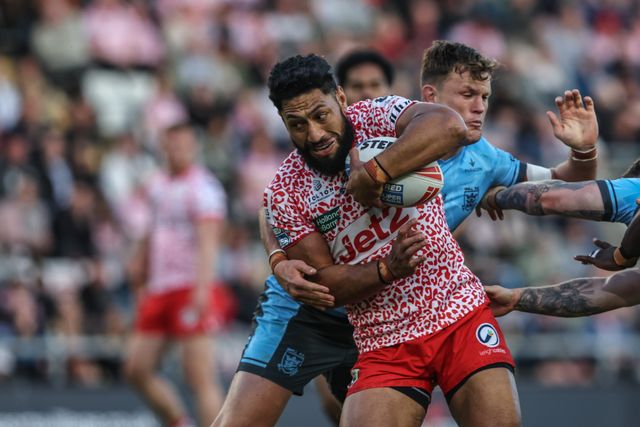 Isaac Liu of Leigh Leopards is tackled during the Betfred Super League Round 12 match Leigh Leopards vs Hull FC at Leigh Sports Village, Leigh, United Kingdom, 22nd May 2025

(Photo by Alfie Cosgrove/News Images)