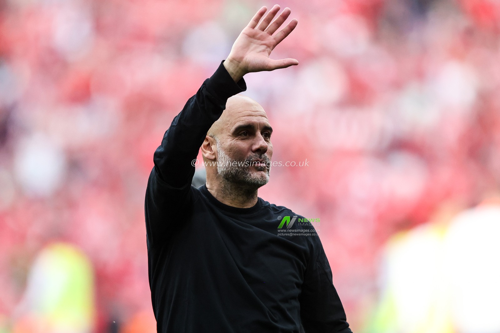 Pep Guardiola manager of Manchester City waves to the travelling fans after the Emirates FA Cup Semi-Final match Nottingham Forest vs Manchester City at Wembley Stadium, London, United Kingdom, 26th April 2025

(Photo by Alfie Cosgrove/News Images)