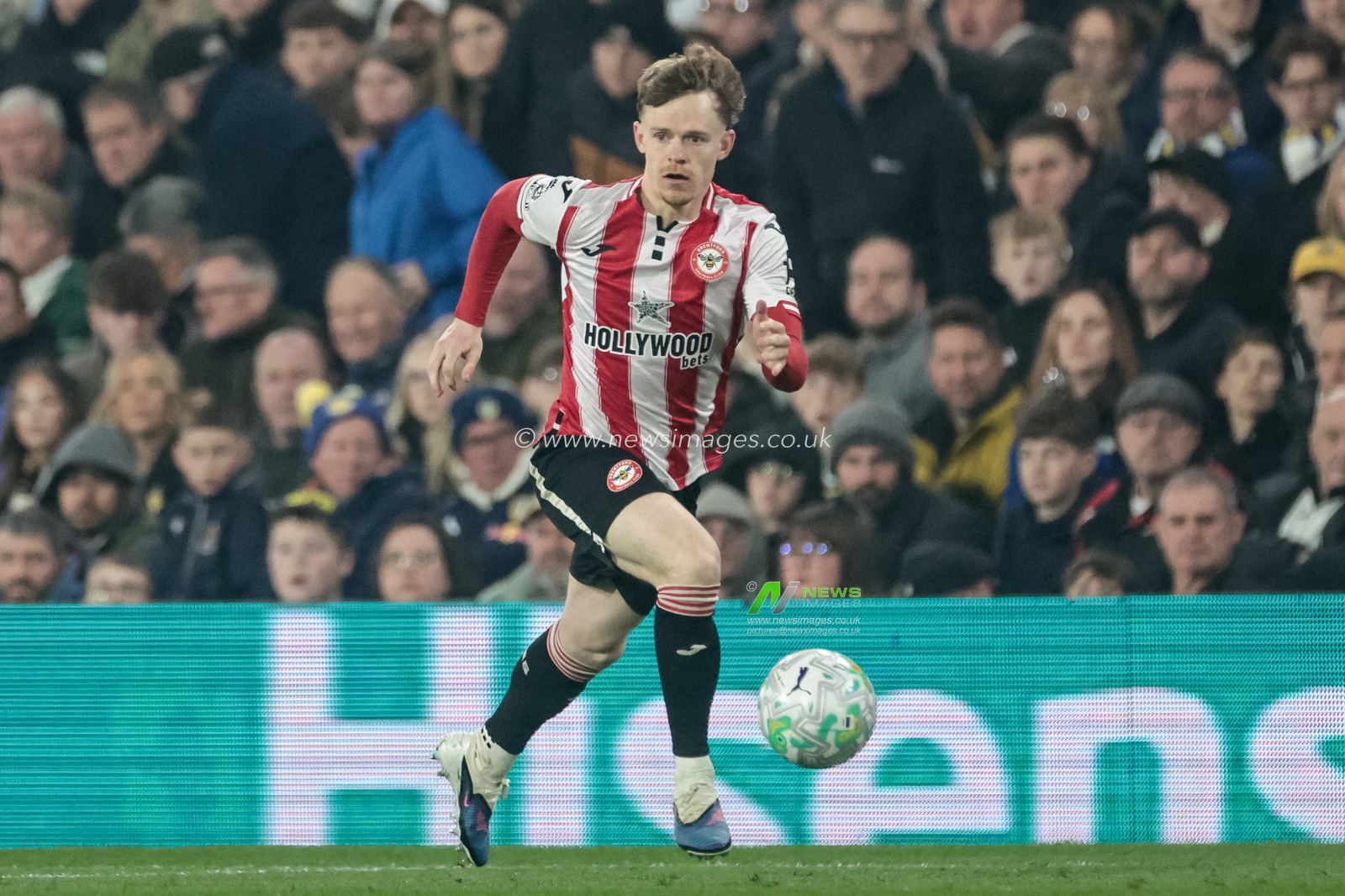 Keane Lewis-Potter of Brentford breaks with the ball during the Premier League match Leeds United vs Brentford at Elland Road, Leeds, United Kingdom on 21 March 2026

(Photo by Mark Cosgrove/News Images)