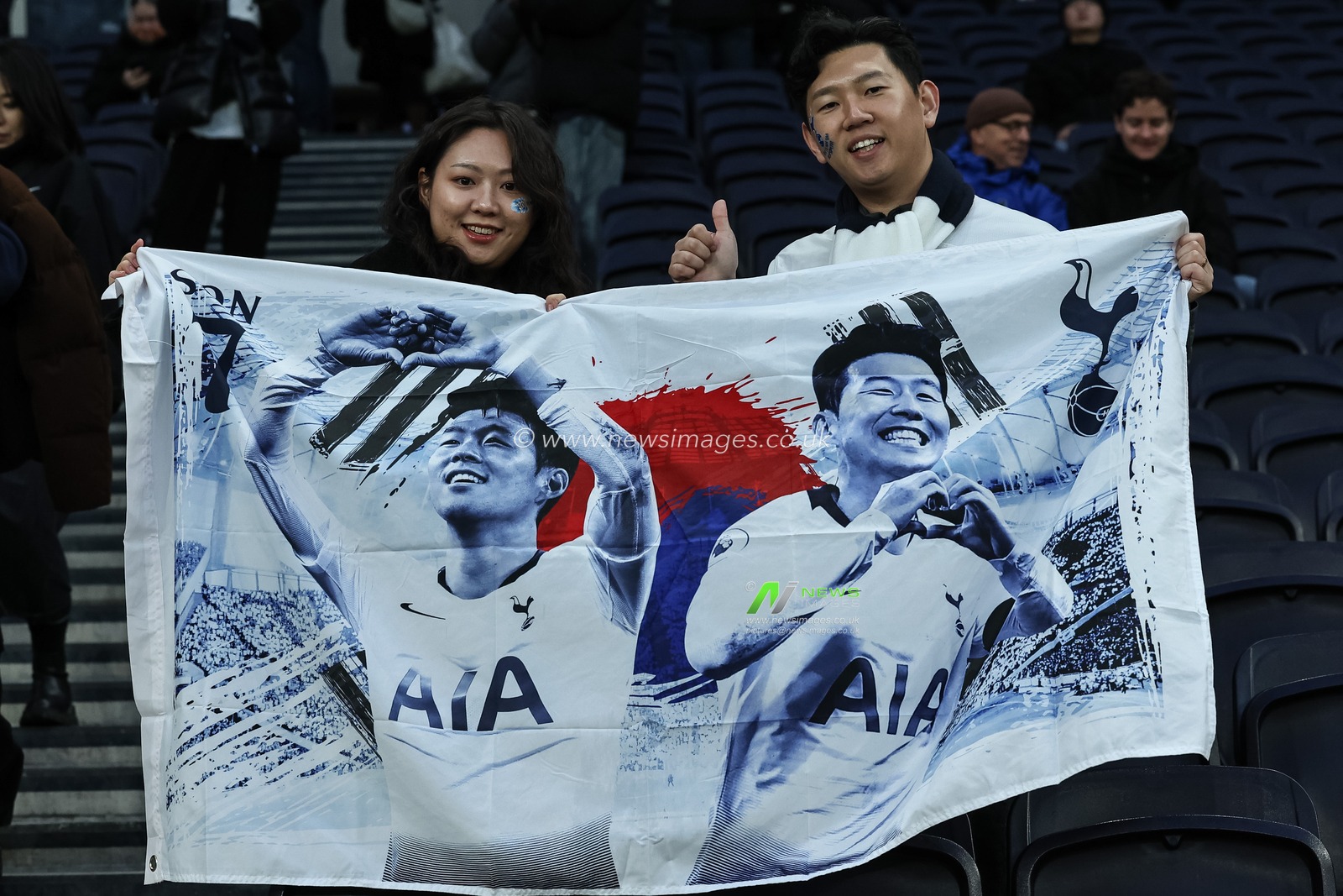 Tottenham fans holding a flag with Son Heung-Min of Tottenham Hotspur on during the Premier League match Tottenham Hotspur vs Chelsea at Tottenham Hotspur Stadium, London, United Kingdom, 8th December 2024

(Photo by Mark Cosgrove/News Images)