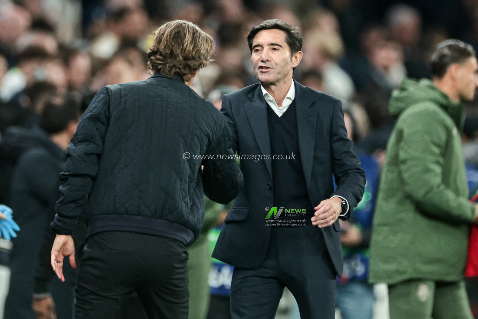 Thomas Frank manager of Tottenham Hotspur and Marcelino Garcia Toral head coach of Villarreal shake hands after the full time whistle the UEFA Champions League match Tottenham Hotspur vs Villarreal at Tottenham Hotspur Stadium, London, United Kingdom, 16th September 2025

(Photo by Mark Cosgrove/News Images)