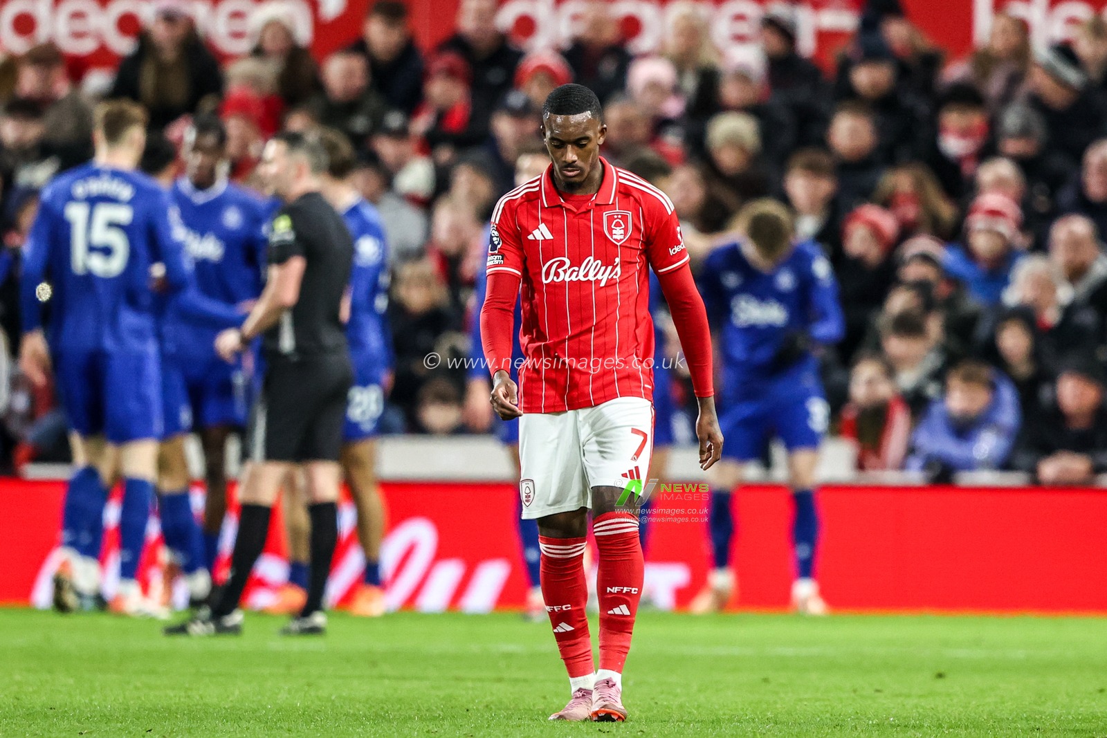A dejected Callum Hudson-Odoi of Nottingham Forest as James Garner of Everton celebrates his goal to make it 0-1 during the Premier League match Nottingham Forest vs Everton at City Ground, Nottingham, United Kingdom, 30th December 2025

(Photo by Alfie Cosgrove/News Images)

*** GER AUT SUI OUT ***