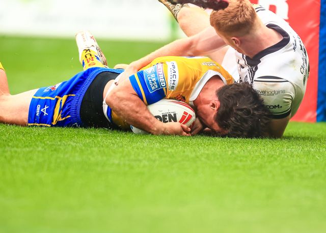 Brodie Croft of Leeds Rhinos goes over for a try during the Betfred Super League Round 24 match Hull FC vs Leeds Rhinos at MKM Stadium, Hull, United Kingdom, 30th August 2025

(Photo by Richard Bierton/News Images)