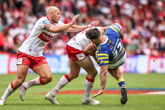 Joe Philbin of Warrington Wolves is tackled by James Batchelor of Hull KR during the Betfred Challenge Cup Semi-Finals match Warrington Wolves vs Hull KR at Eco-Power Stadium, Doncaster, United Kingdom on 10 May 2026

(Photo by Alfie Cosgrove/News Images)