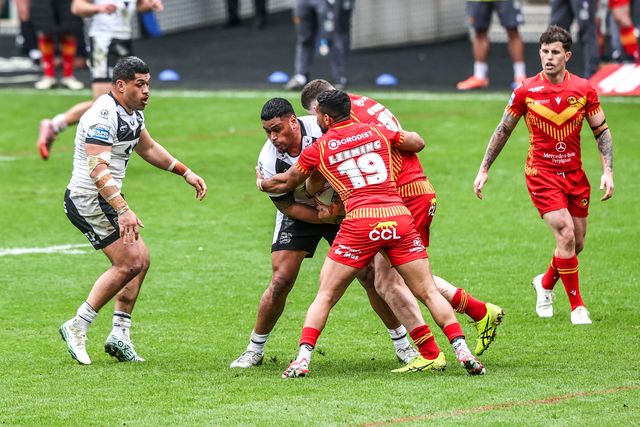 Sam Lisone of Hull FC is tackled by Kruise Leeming of Catalans Dragons during the Betfred Super League round 6 match Hull FC vs Catalans Dragons at MKM Stadium, Hull, United Kingdom on 29 March 2026

(Photo by Alfie Cosgrove/News Images)