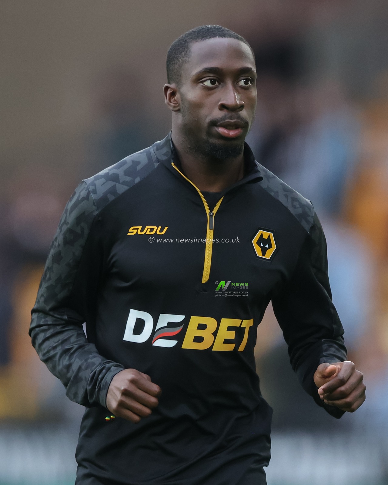Carlos Forbs of Wolverhampton Wanderers warms up ahead of the Premier League match Wolverhampton Wanderers vs Newcastle United at Molineux, Wolverhampton, United Kingdom, 15th September 2024

(Photo by Alfie Cosgrove/News Images)