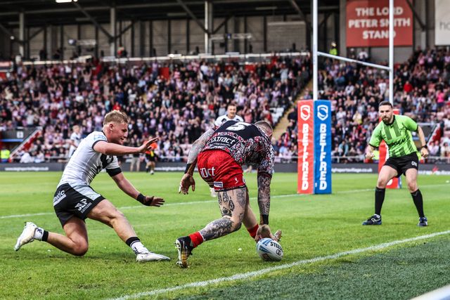Josh Charnley of Leigh Leopards goes over for a try during the Betfred Super League round 12 match Leigh Leopards vs Hull FC at Leigh Sports Village, Leigh, United Kingdom on 22 May 2026

(Photo by Alfie Cosgrove/News Images)