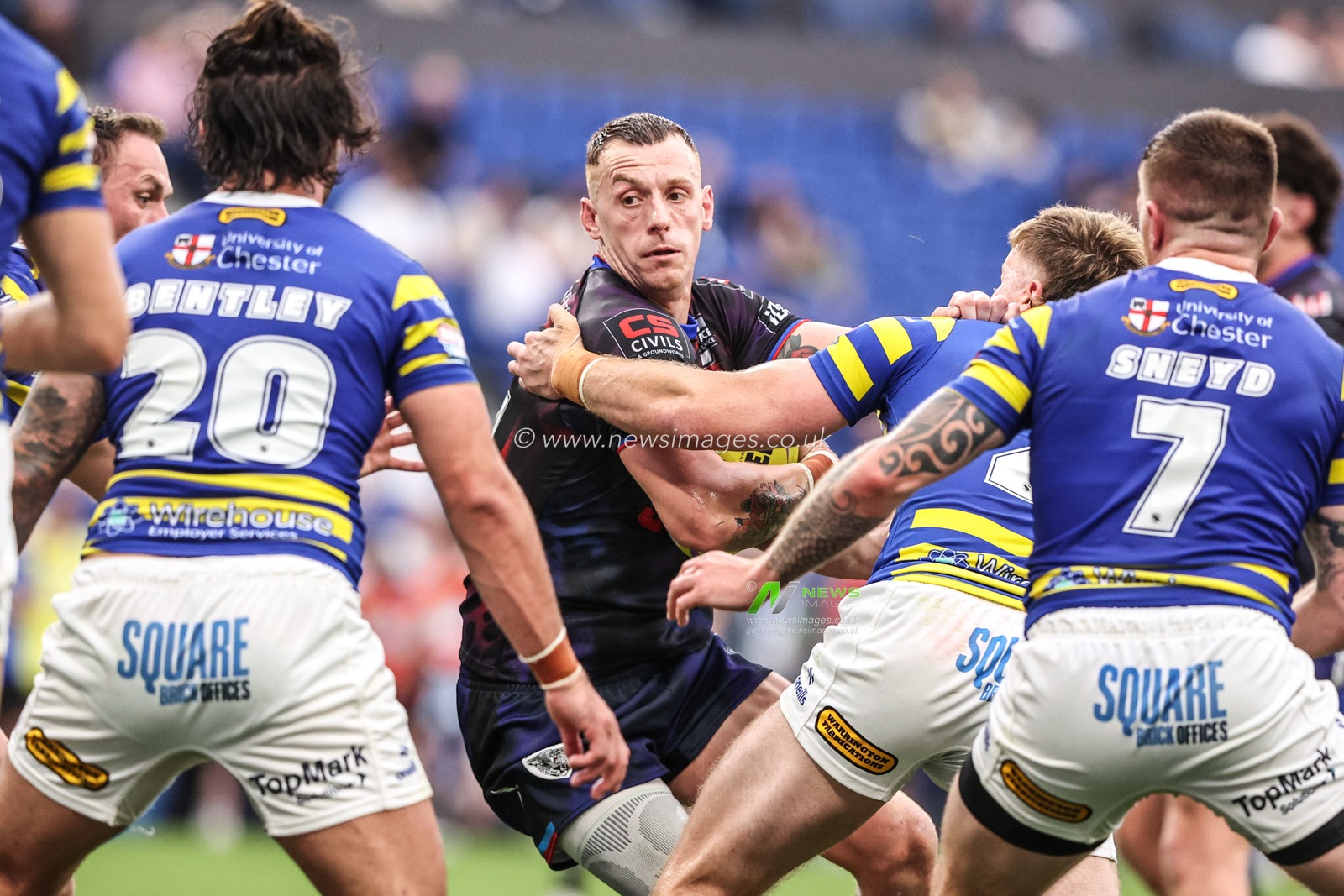Frankie Halton of Leigh Leopards is tackled by Luke Thomas of Warrington Wolves during the Betfred Super League Magic Weekend match Leigh Leopards vs Warrington Wolves at Leigh Sports Village, Leigh, United Kingdom on 04 July 2026

(Photo by Alfie Cosgrove/News Images)