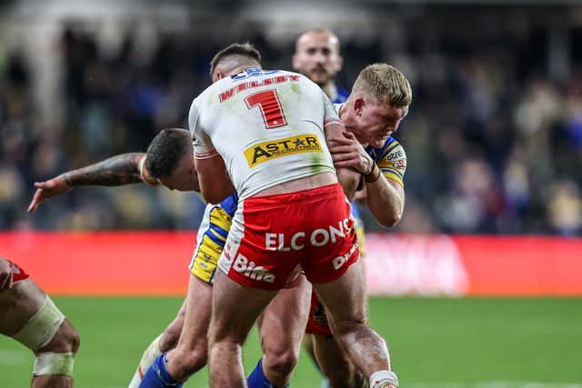 James McDonnell of Leeds Rhinos is tackled by Jack Welsby of St. Helens during the Betfred Super League play-off Eliminator 1 match Leeds Rhinos vs St Helens at Headingley Stadium, Leeds, United Kingdom, 27th September 2025

(Photo by Alfie Cosgrove/News Images)