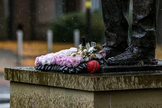 A cricket ball with the message RIP Dickie from Elsecar Cricket Club is placed on The Harold Dennis “Dickie” Bird OBE Statue during the Funeral of Harold Dennis “Dickie” Bird OBE at St Mary's Church, Barnsley, United Kingdom, 19th October 2025

(Photo by Alfie Cosgrove/News Images)