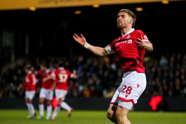 Sam Smith of Wrexham AFC celebrates his goal to make it 2-2 during the Sky Bet League 1 match Cambridge United vs Wrexham at Abbey Stadium, Cambridge, United Kingdom, 1st April 2025

(Photo by Izzy Poles/News Images)