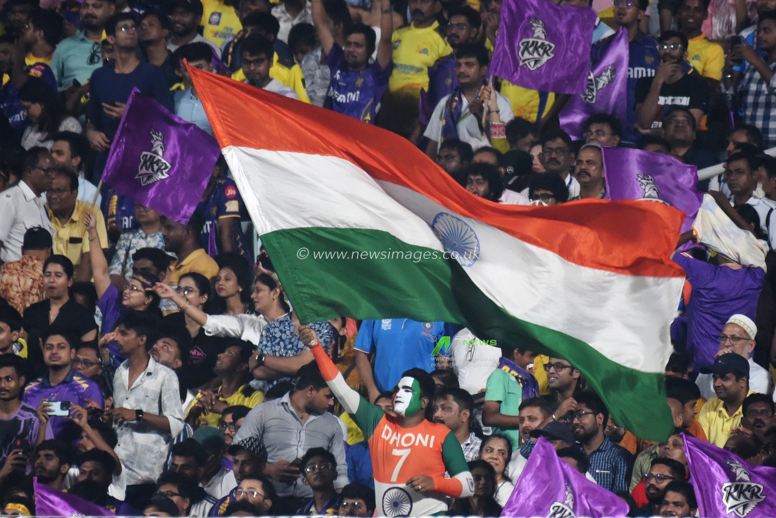 A cricket lover  national flag color paints his body and waves the National Flag during the 2025 IPL match between Kolkata Knight Riders and Chennai Super Kings at Eden Gardens on May 07, 2025, in Kolkata, India.Photo by Debajyoti Chakraborty.(Photo: Debajyoti Chakraborty/News Images)