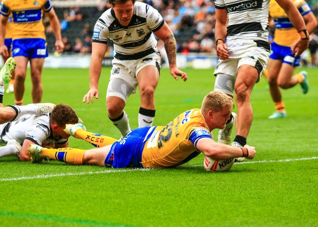 James McDonnell of Leeds Rhinos goes over for a try  during the Betfred Super League Round 24 match Hull FC vs Leeds Rhinos at MKM Stadium, Hull, United Kingdom, 30th August 2025

(Photo by Richard Bierton/News Images)