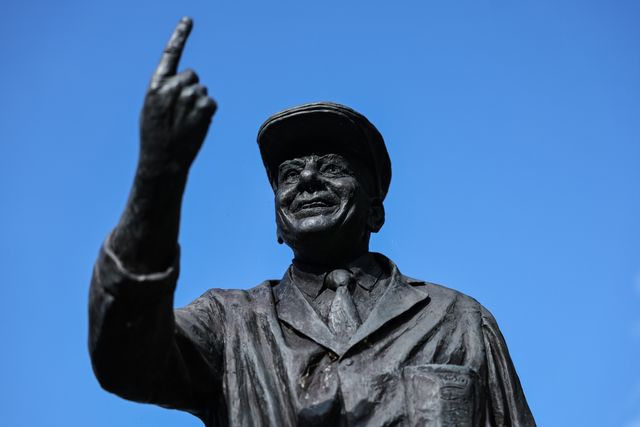 Flowers are laid at The Harold 'Dickie' Bird MBE, OBE statue after his passing today at the age of 92, Barnsley, United Kingdom, 23rd September 2025

(Photo by Mark Cosgrove/News Images)