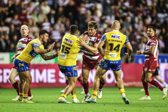 Ethan Havard of Wigan Warriors is tackled by Sam Lisone of Leeds Rhinos during the Betfred Super League round 27 match Wigan Warriors vs Leeds Rhinos at The Brick Community Stadium, Wigan, United Kingdom, 19th September 2025

(Photo by Alfie Cosgrove/News Images)