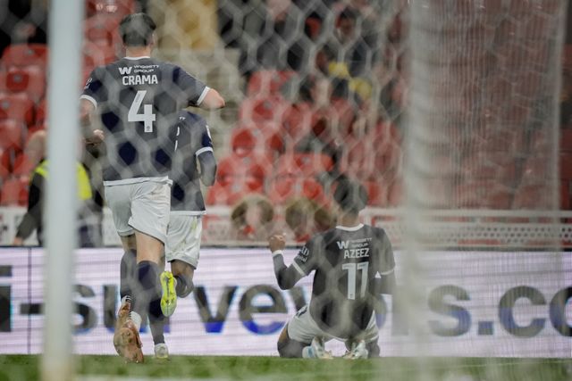 Femi Azeez of Millwall celebrates his goal to make it 0-2 during the Sky Bet Championship match Stoke City vs Millwall at Bet365 Stadium, Stoke On Trent, United Kingdom on 21 April 2026

(Photo by Maynard Manyowa/News Images)