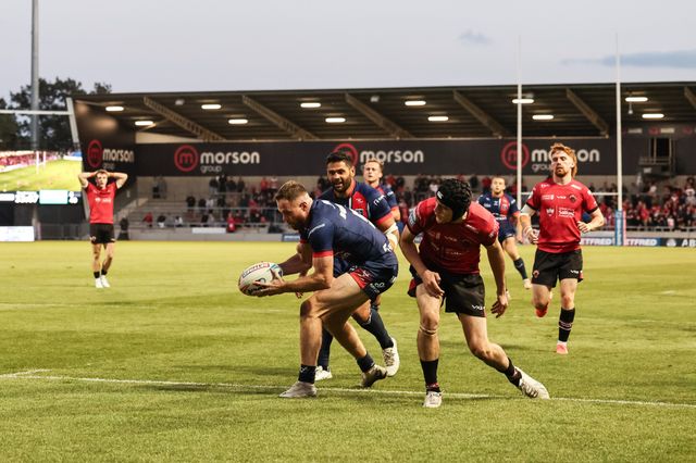 Joe Burgess of Hull KR goes over for his fourth try during the Betfred Super League Round 20 Salford Red Devils vs Hull KR at Salford Community Stadium, Eccles, United Kingdom, 31st July 2025

(Photo by Mark Cosgrove/News Images)
