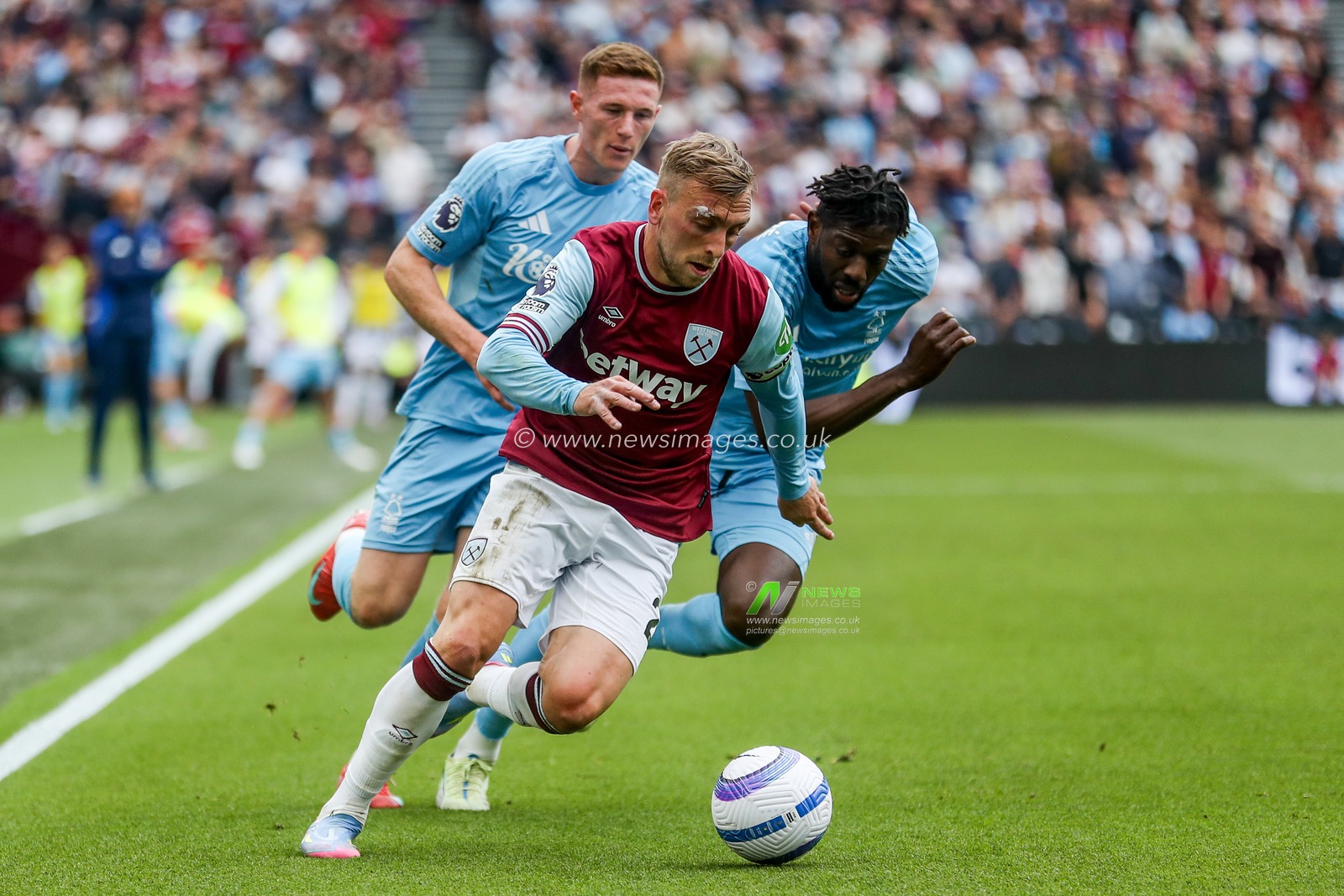 Jarrod Bowen of West Ham United is put under pressure by Elliot Anderson and Anthony Elanga of Nottingham Forest during the Premier League match West Ham United vs Nottingham Forest at London Stadium, London, United Kingdom, 18th May 2025

(Photo by Izzy Poles/News Images)