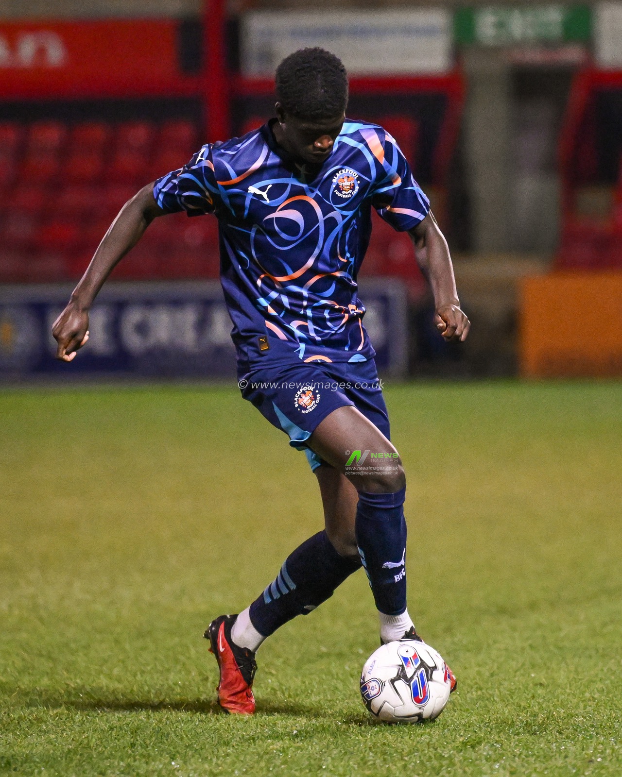 Terry Bondo of Blackpool makes a break with the ball  during the FA Youth Cup U18â€™s match Crewe Alexandra vs Blackpool at The Mornflake Stadium, Crewe, United Kingdom, 27th November 2024

(Photo by Craig Thomas/News Images)