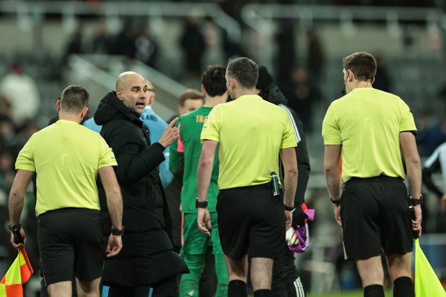 Pep Guardiola manager of Manchester City speaks to Referee Chris Kavanagh and his officials after the final whistle during the Carabao Cup Semi-finals First Leg Newcastle United vs Manchester City at St. James's Park, Newcastle, United Kingdom, 13th January 2026

(Photo by Mark Cosgrove/News Images)