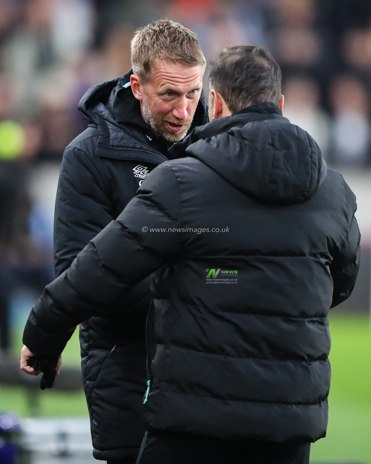 Graham Potter manager of West Ham United and Vitor Pereira head coach of Wolverhampton Wanderers shake hands during the Premier League match Wolverhampton Wanderers vs West Ham United at Molineux, Wolverhampton, United Kingdom, 1st April 2025

(Photo by Gareth Evans/News Images)