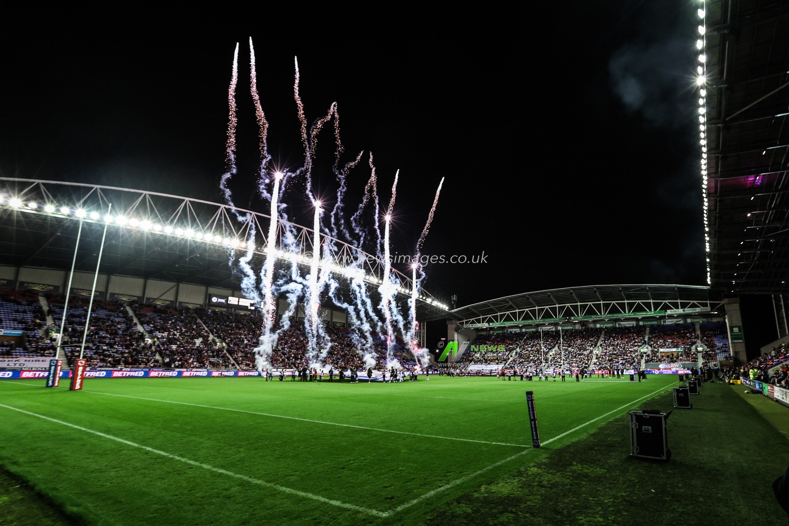 The pre-game firework and pyrotechnic display during the Betfred Super League round 27 match Wigan Warriors vs Leeds Rhinos at The Brick Community Stadium, Wigan, United Kingdom, 19th September 2025

(Photo by Alfie Cosgrove/News Images)