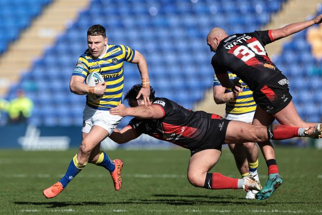 George Williams of Warrington Wolves powered past Andre Savelio of Goole Vikings during the Betfred Challenge Cup round 4 match Goole Vikings vs Warrington Wolves at The Halliwell Jones Stadium, Warrington, United Kingdom on 14 March 2026

(Photo by Mark Cosgrove/News Images)