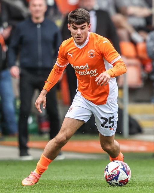 Rob Apter of Blackpool breaks with the ball during the Sky Bet League 1 match Blackpool vs Wrexham at Bloomfield Road, Blackpool, United Kingdom, 21st April 2025

(Photo by Alfie Cosgrove/News Images)