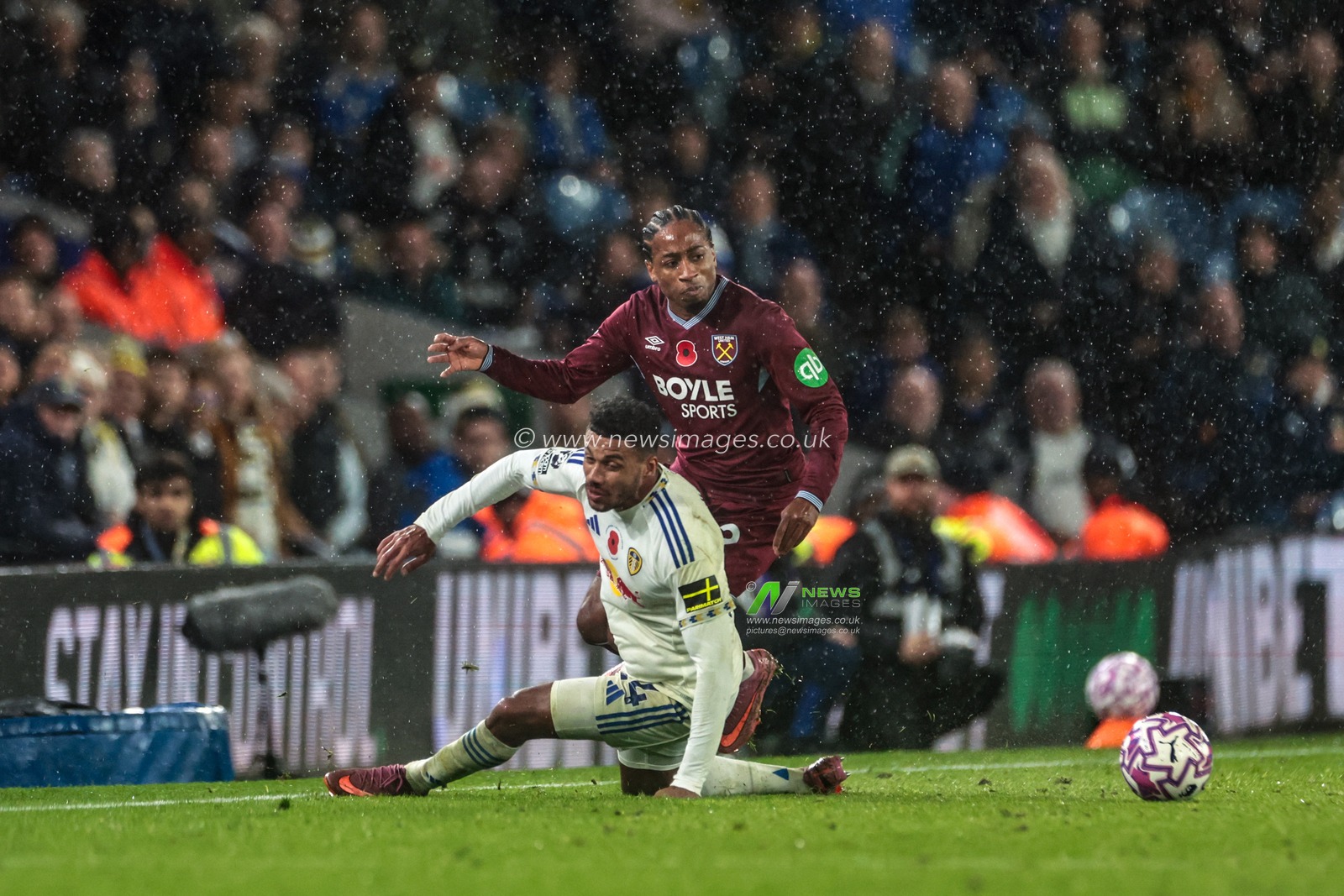 James Justin of Leeds United fouls Kyle Walker-Peters of West Ham United and receives a yellow card during the Premier League match Leeds United vs West Ham United at Elland Road, Leeds, United Kingdom, 24th October 2025

(Photo by Mark Cosgrove/News Images)