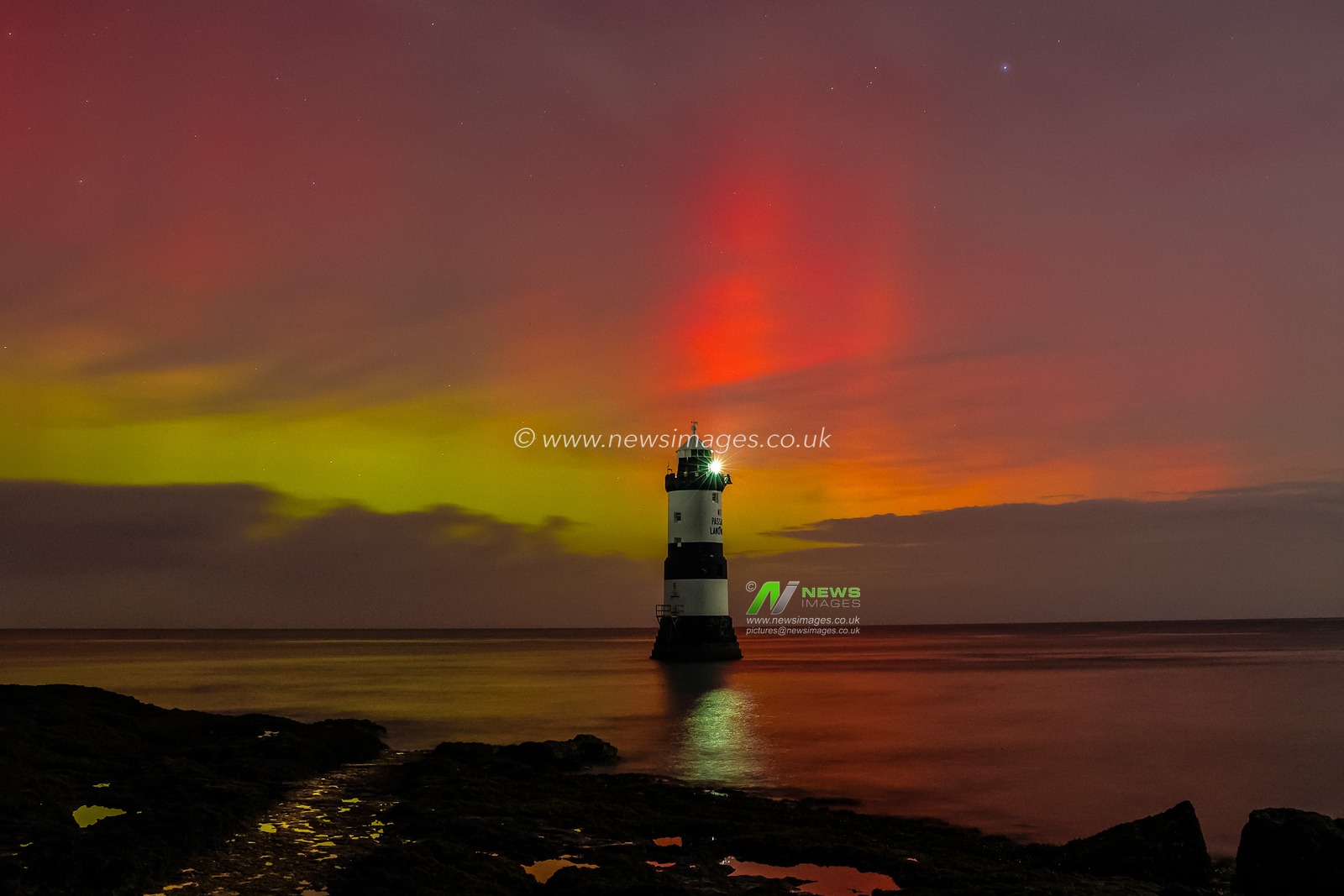 Northern Lights also know as the Aurora Borealis shine and dance over Penmon Lighthouse, Penmon, on Anglesey, United Kingdom, 12th November 2025

(Photo by Mark Cosgrove/News Images)

*** GER AUT SUI OUT ***