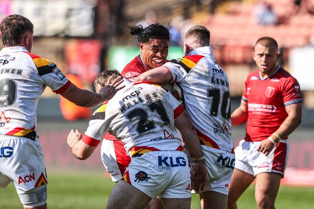 Tom Amone of Hull KR is tackled by Sam Hallas of Bradford Bulls and Loghan Lewis of Bradford Bulls during the Betfred Super League round 9 match Bradford Bulls vs Hull KR at Odsal Stadium, Bradford, United Kingdom on 25 April 2026

(Photo by Alfie Cosgrove/News Images)