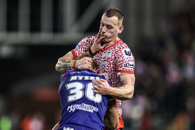 Jayden Myers of Wakefield Trinity is tackled by Frankie Halton of Leigh Leopards during the Betfred Super League play-off Eliminator 1 match Leigh Leopards vs Wakefield Trinity at Progress With Unity Stadium, Leigh, United Kingdom, 26th September 2025

(Photo by Alfie Cosgrove/News Images)