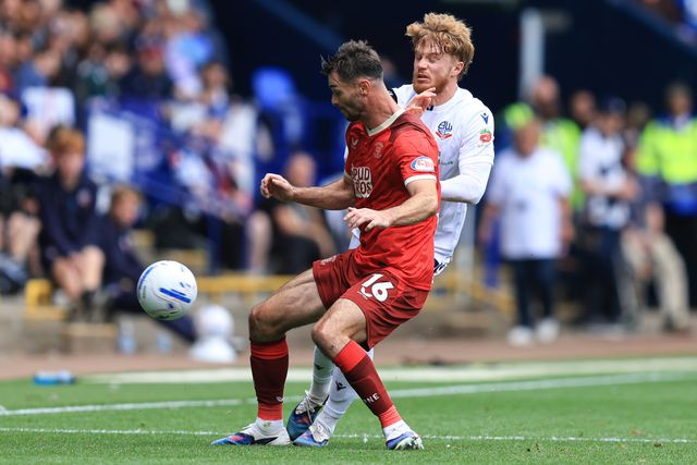 Luca Stephenson of Bolton Wanderers is tackled by Andrew Hughes of Preston North End during the Sky Bet Championship match Bolton Wanderers vs Preston North End at Toughsheet Community Stadium, Bolton, United Kingdom on 15 August 2026

(Photo by Jorge Horsted/News Images)
