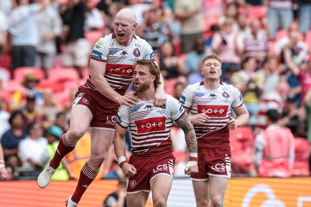 Adam Keighran of Wigan Warriors celebrates his try during the Betfred Challenge Cup Final match Wigan Warriors vs Hull KR at Wembley Stadium, London, United Kingdom on 30 May 2026

(Photo by Mark Cosgrove/News Images)