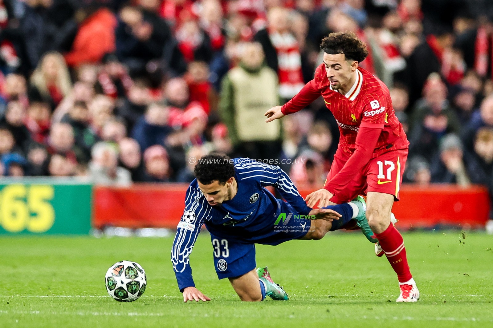 Warren Zaire-Emery of Paris Saint-Germain is challenged by Curtis Jones of Liverpool during the UEFA Champions League Last 16 match Liverpool vs Paris Saint-Germain at Anfield, Liverpool, United Kingdom, 11th March 2025

(Photo by Mark Cosgrove/News Images)