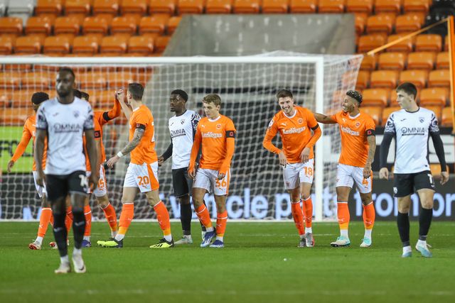 Jake Beesley #18 of Blackpool celebrates his goal to make it 1-0 during the Bristol Street Motors Trophy match Blackpool vs Morecambe at Bloomfield Road, Blackpool, United Kingdom, 14th November 2023

(Photo by Gareth Evans/News Images)