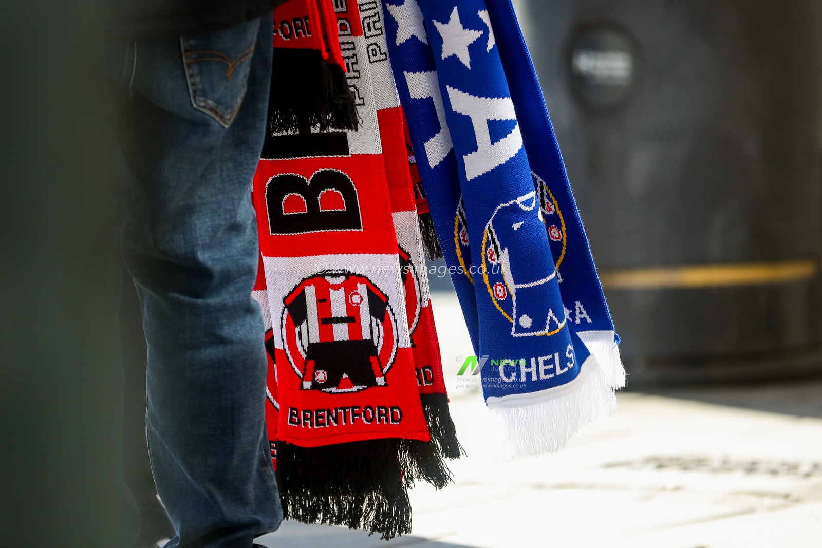 Brentford and Chelsea match scarves are sold outside of The Gtech Community Stadium prior to the Premier League match Brentford vs Chelsea at The Gtech Community Stadium, London, United Kingdom, 6th April 2025

(Photo by Izzy Poles/News Images)
