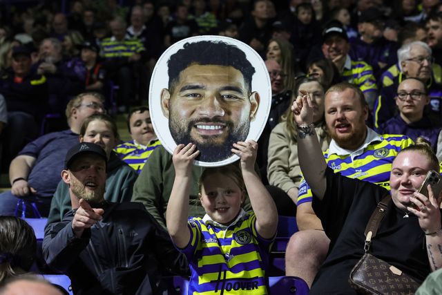 A Wire fan with a Kelepi Tanginoa of Warrington Wolves head mask during the Betfred Super League round 9 match Warrington Wolves vs Wigan Warriors at The Halliwell Jones Stadium, Warrington, United Kingdom on 24 April 2026

(Photo by Mark Cosgrove/News Images)