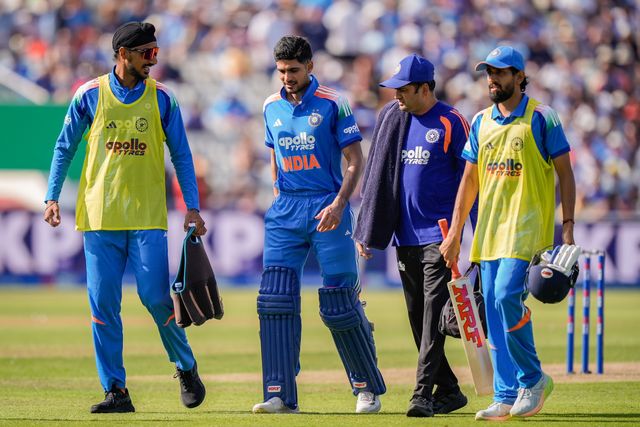 India captain Shubman Gill walks off the field escorted by team physio and teammates with a potential injury and retires hurt during the 1st Metro Bank ODI match England vs India at Edgbaston, Birmingham, United Kingdom on 14 July 2026

(Photo by Maynard Manyowa/News Images)