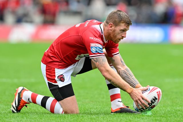 Marc Sneyd of Salford Red Devils sets the ball ready for a conversion attempt during the Betfred Super League Round 16 match Salford Red Devils vs Hull FC at Salford Community Stadium, Eccles, United Kingdom, 7th July 2024

(Photo by Cody Froggatt/News Images)