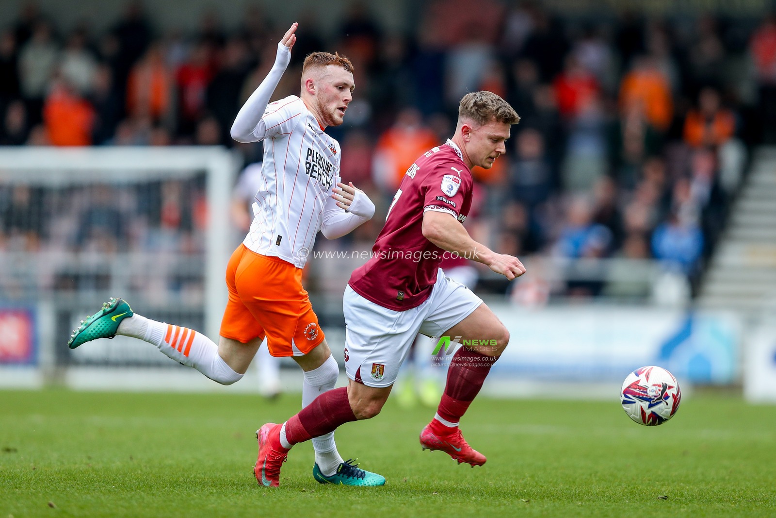 Sam Hoskins of Northampton Town is put under pressure by Sonny Carey of Blackpool during the Sky Bet League 1 match Northampton Town vs Blackpool at Sixfields Stadium, Northampton, United Kingdom, 22nd March 2025

(Photo by Izzy Poles/News Images)