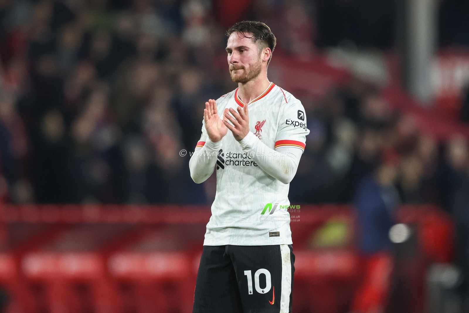 Alexis Mac Allister of Liverpool applauds the fans after the final whistle during the Premier League match Nottingham Forest vs Liverpool at City Ground, Nottingham, United Kingdom, 14th January 2025

(Photo by Alfie Cosgrove/News Images)