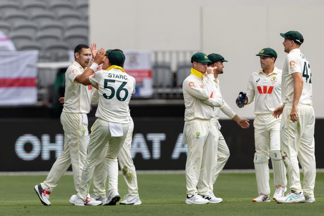 Scott Boland of Australia is congratulated by his team mates after taking a wicket during the NRMA Insurance Ashes First Test Day 2 Australia vs England at Optus Stadium, Perth, Australia, 22nd November 2025

(Photo by Santanu Banik/News Images)

*** GER AUT SUI OUT ***